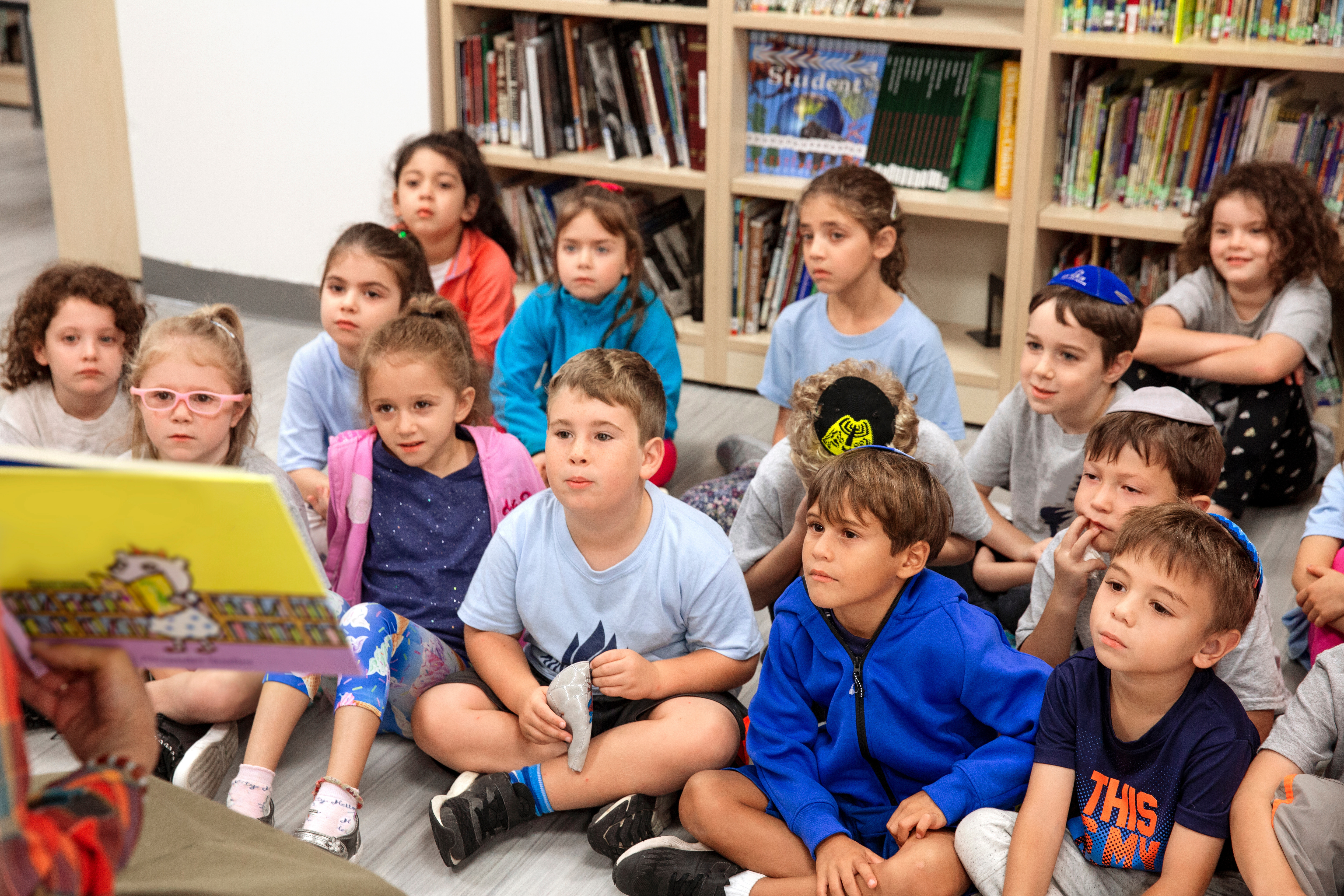 Children listening to story Children listening to story
