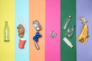 Different garbage on color background