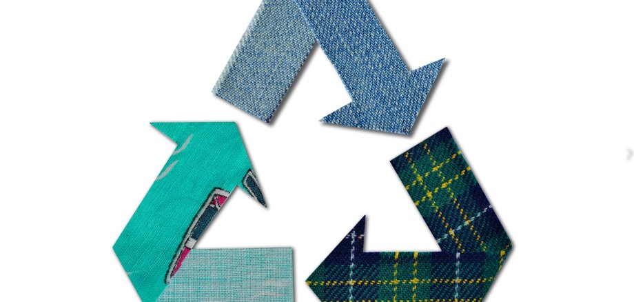 Recycling symbol made of fabric on white background - Concept of ecology 